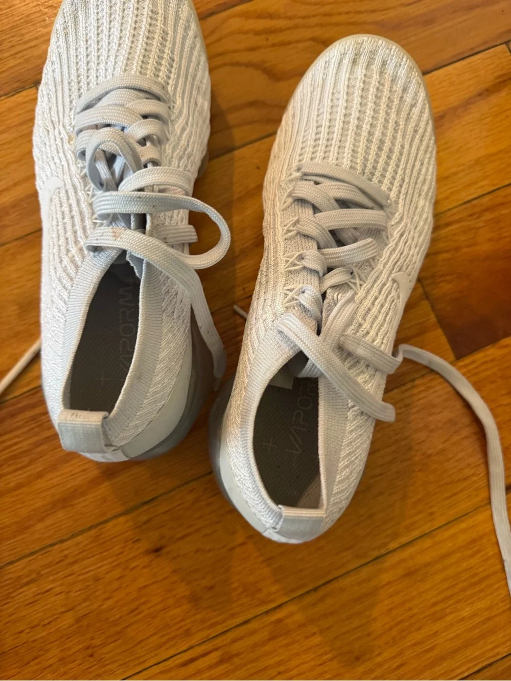 Nike Light Gray Knit Sneaker with Black Swoosh Detail